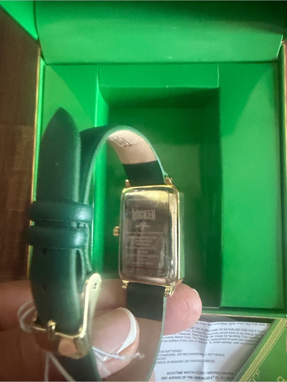 Universal Gold-Tone Rectangular Watch with Green Strap - Picture 3 of 8